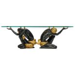 A blackamoor coffee table with glass top, H 50,5 - W 159,5 - D 79,5 cm