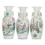 Two Chinese famille rose vases, decorated with a gallant garden scene and calligraphic texts;