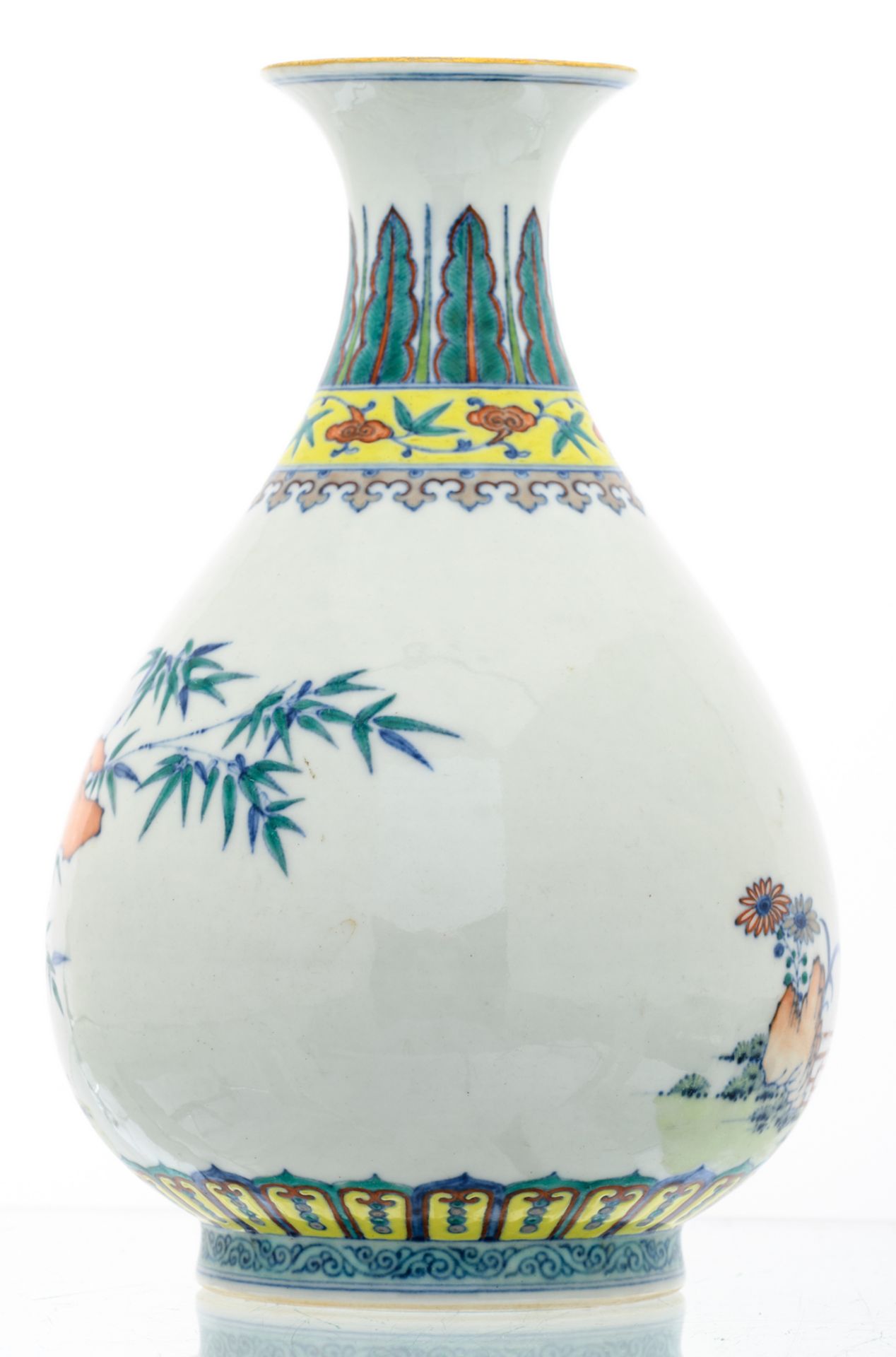 A Chinese doucai overall decorated pear shaped vase with various plants amid rockwork in the garden, - Image 3 of 7