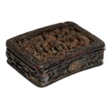 A fine relief decorated chinoiserie tortoise shell snuffbox and cover depicting various scenes