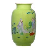 A Chinese lime-green ground decorated vase with savants in a garden, with a Yongzheng mark, H 29 cm