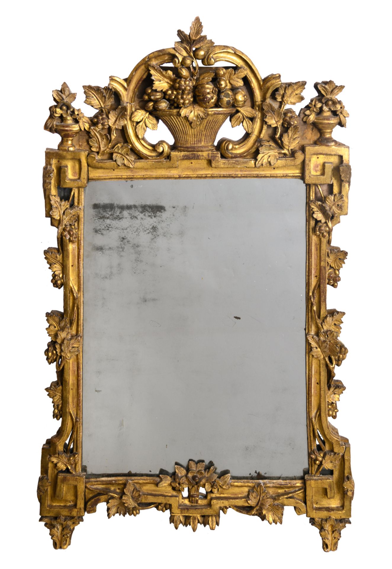 A mirror in a carved and gilt wooden Neoclassical 18thC frame, H 120,5 - W 73 cm