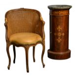 A caned and leather upholstered walnut Rococo style chair; added a round 19thC mahogany night