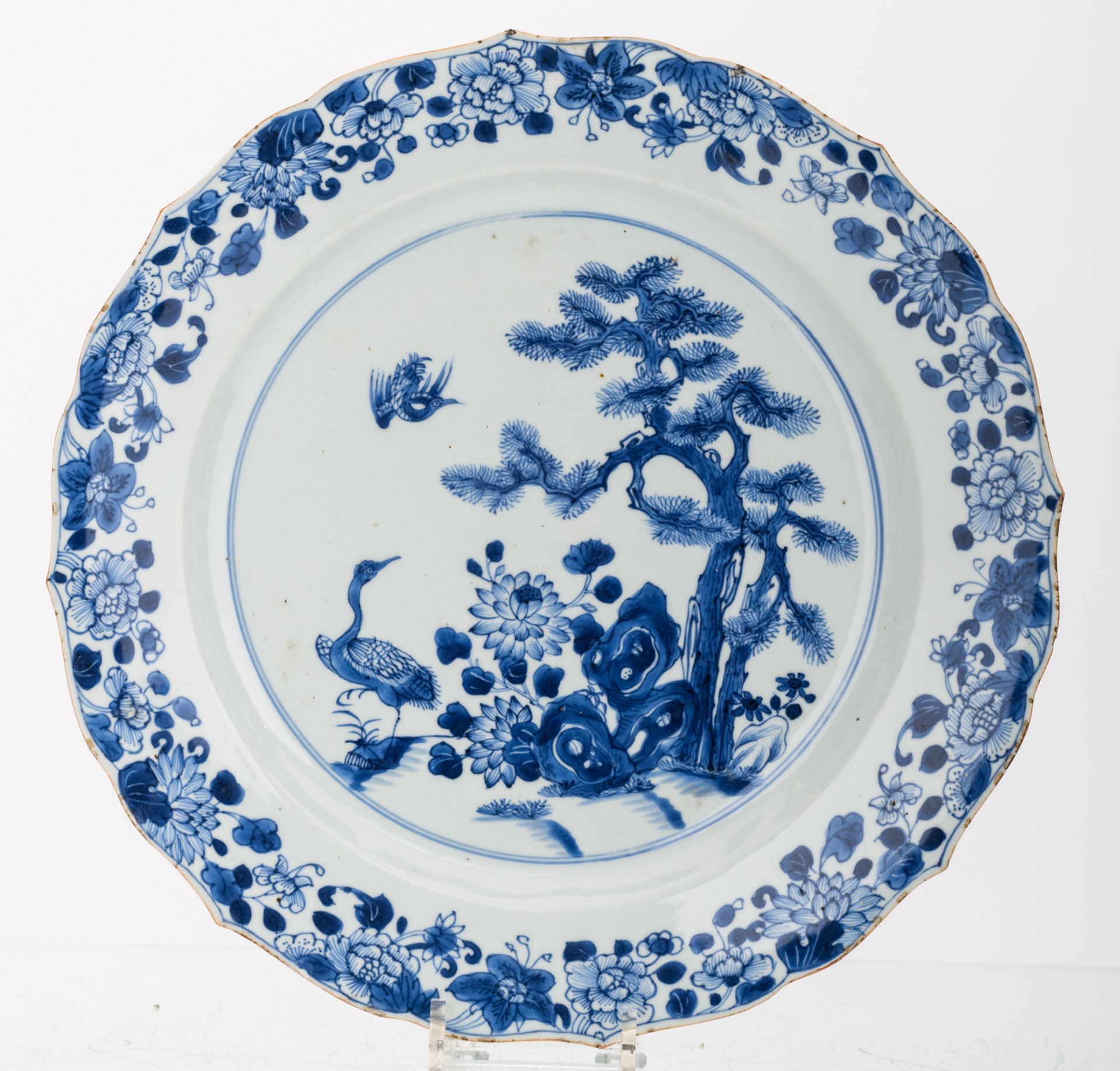 Two Chinese blue and white floral decorated plates, 18thC; added a Chinese iron red and gilt - Image 3 of 4