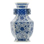 A fine Chinese blue and white floral decorated Hu vase with lotus flowers, Qianlong marked, 18/