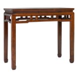 A Chinese rectangular hardwood side table, H 82,5 - W 97,5 - D 45,5 cm