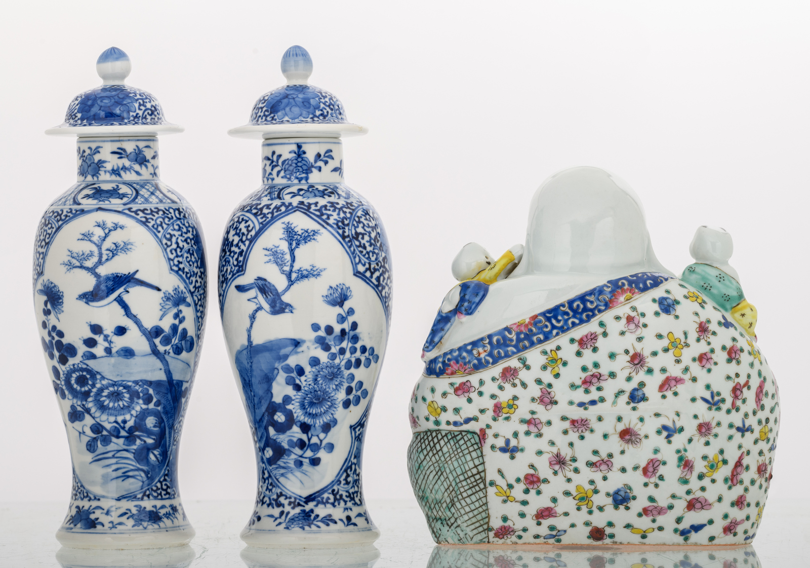 Two Chinese blue and white floral decorated baluster shaped vases and covers, the roundels with a - Image 3 of 7