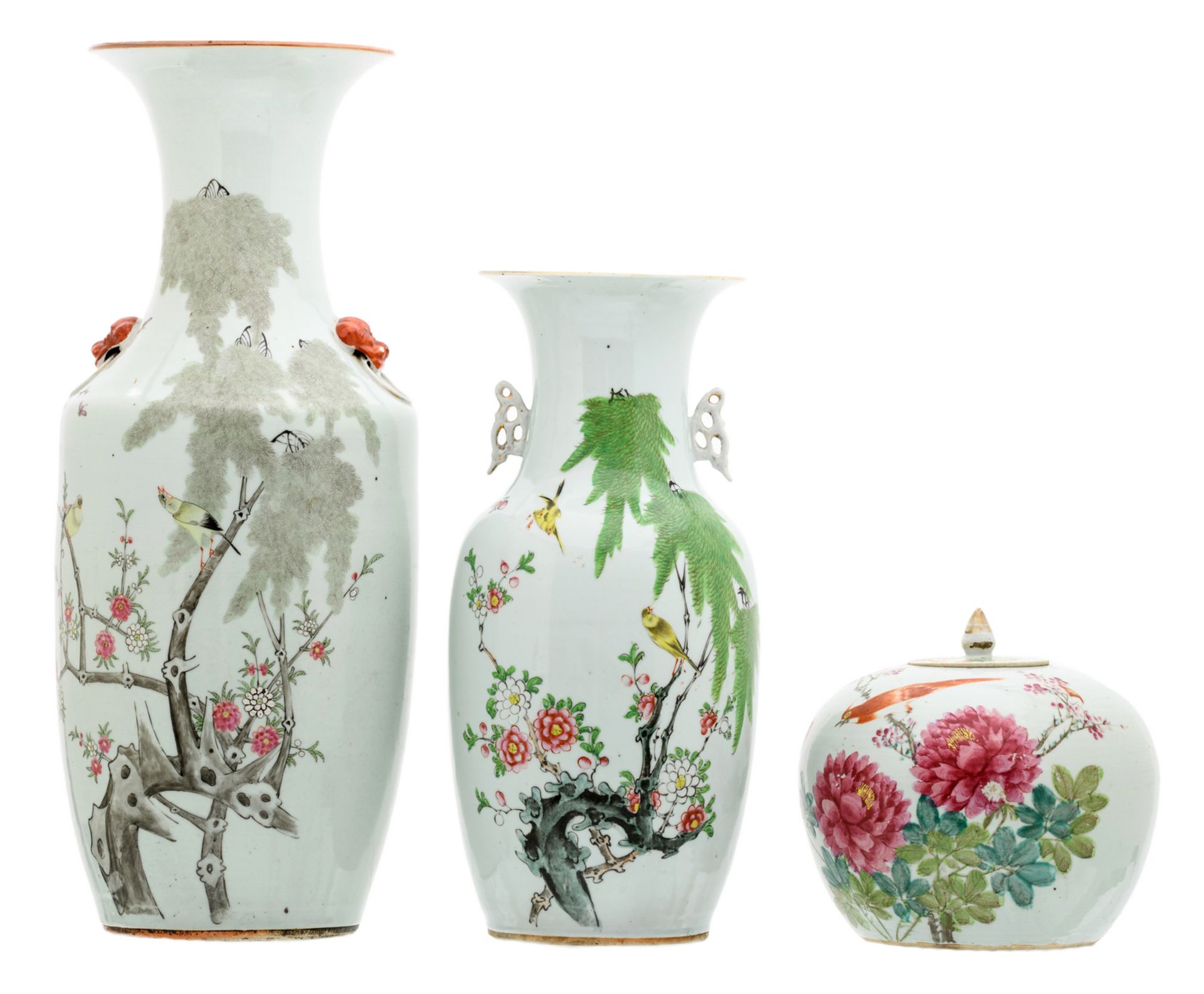 Two Chinese famille rose vases and a ditto ginger jar and cover, decorated with flower branches
