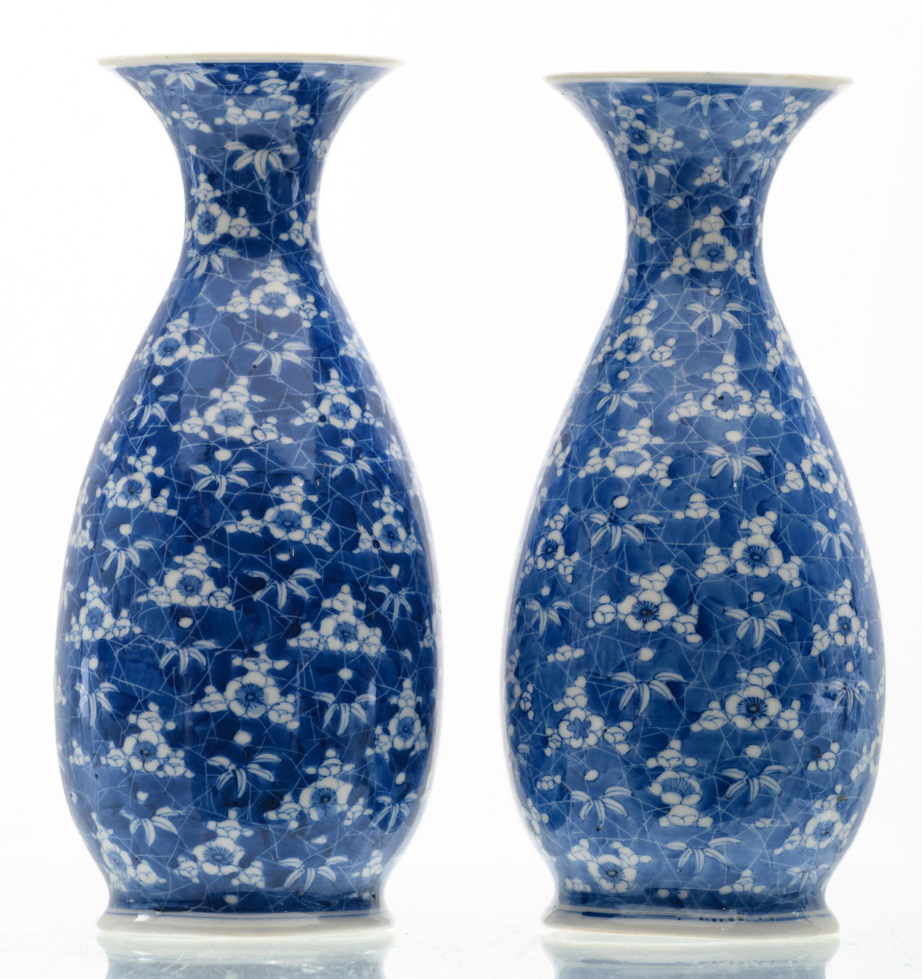 Two Japanese blue and white floral decorated vases, marked, Meiji and period, H 26 cm - Image 4 of 6