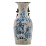 A Chinese grey celadon ground blue and white decorated stoneware vase with figures in a