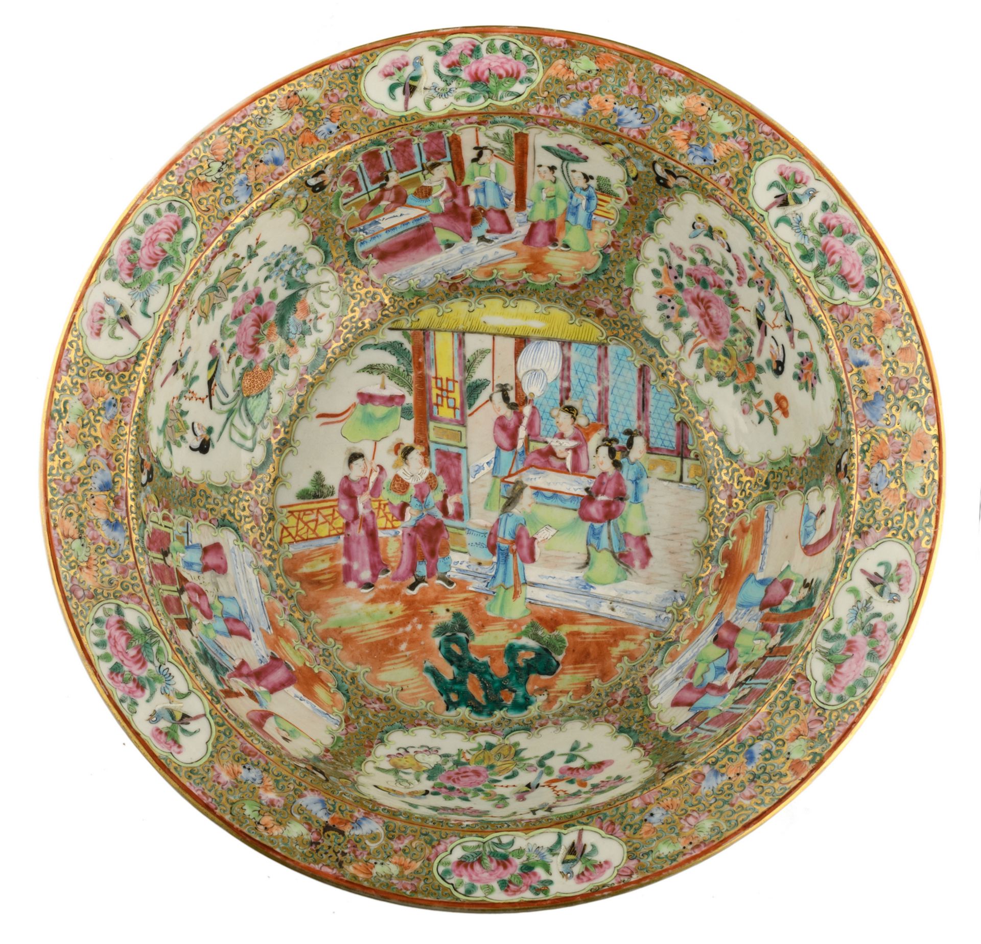 A Chinese Canton famille rose floral decorated bowl, the roundels with court scenes, birds,