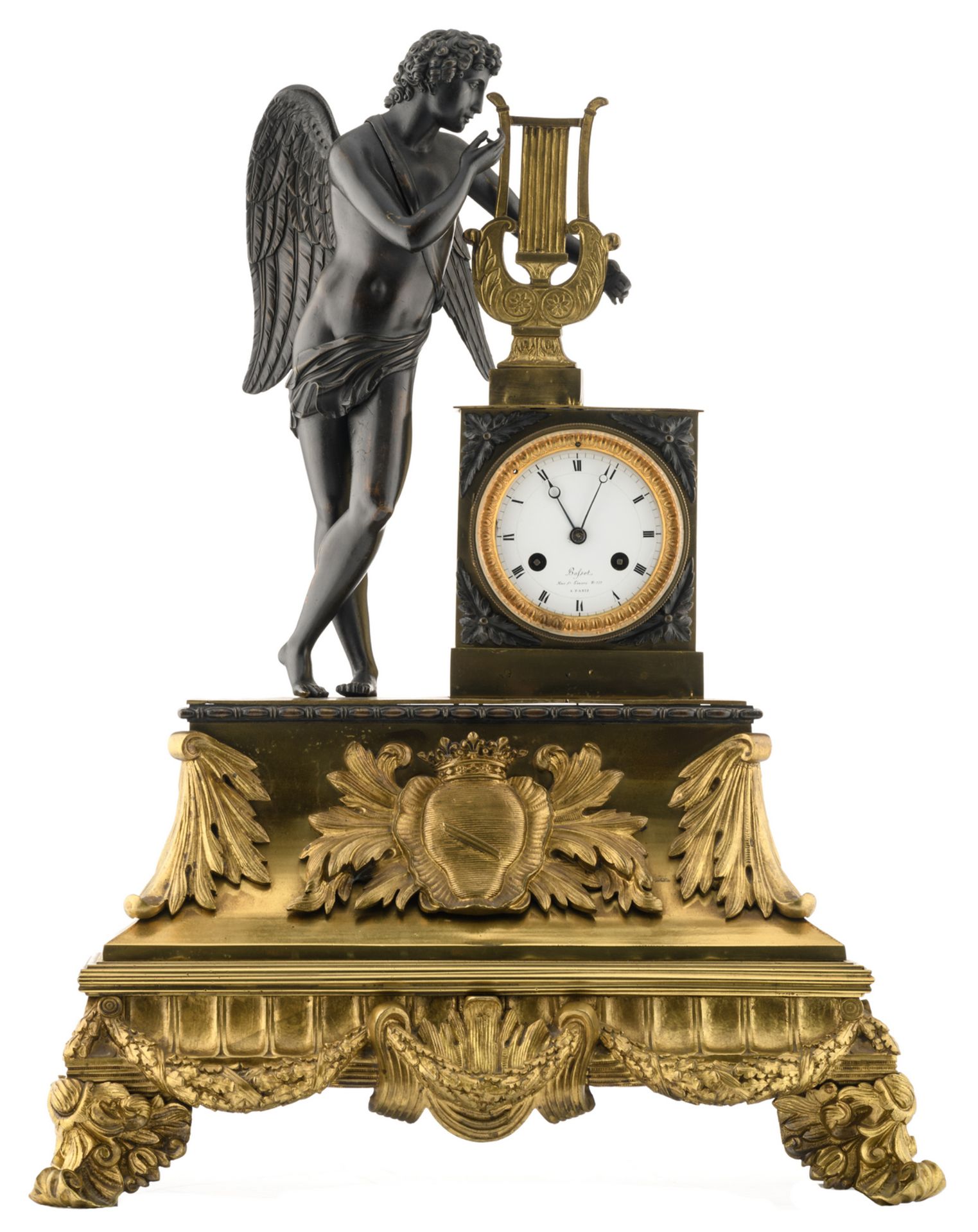 A third quarter of the 19thC gilt and patinated bronze mantle clock with on top Apollo with kithara,