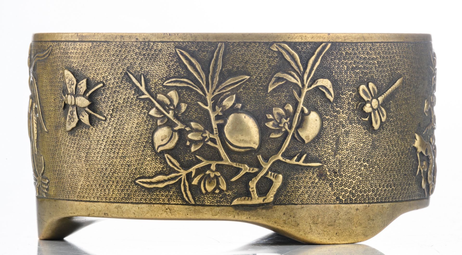 A Chinese bronze relief decorated tripod incense burner with flower branches, butterflies and - Bild 5 aus 7