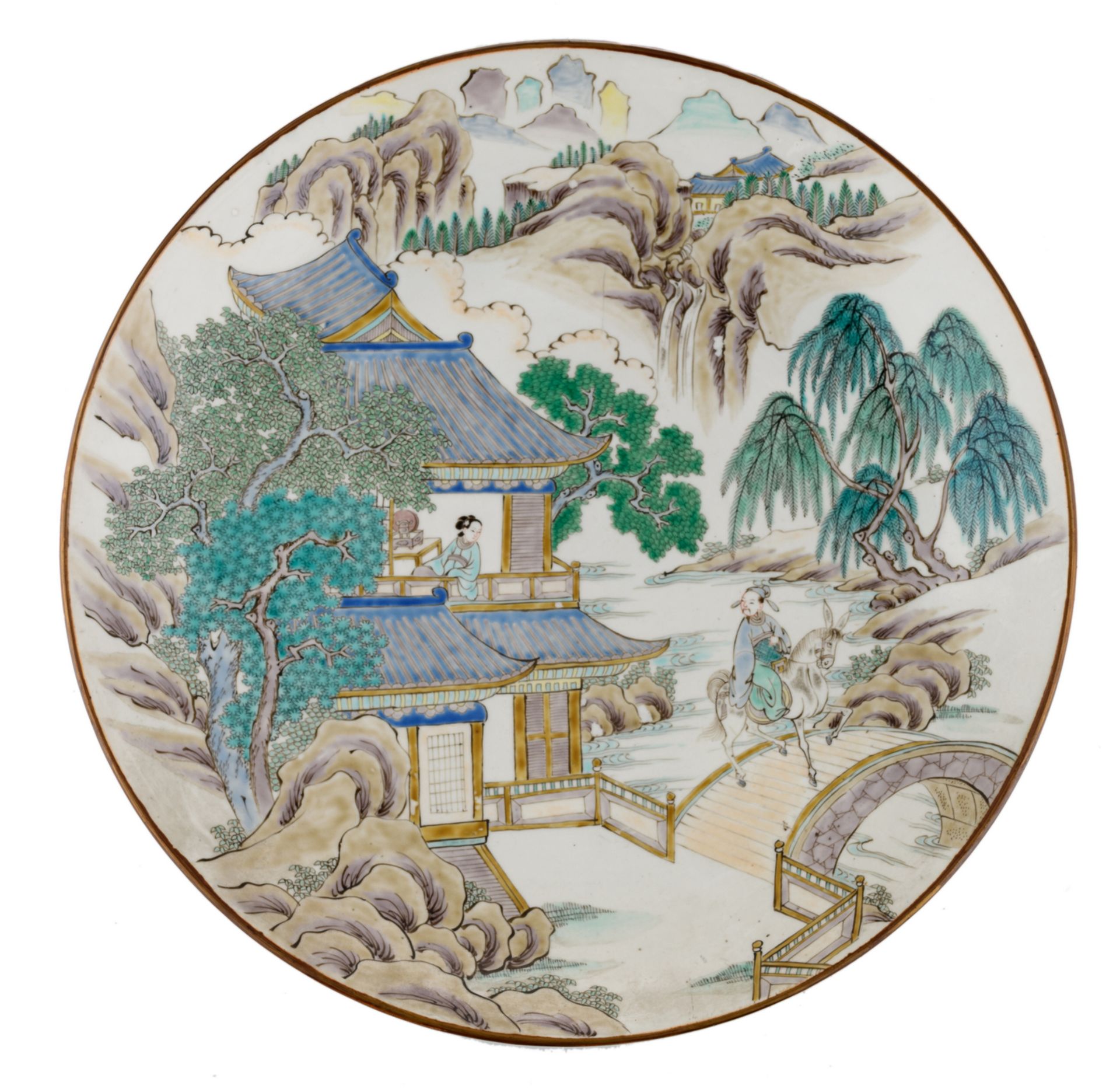 A Chinese polychrome plate, depicting an animated scene in a mountainous river landscape, with a