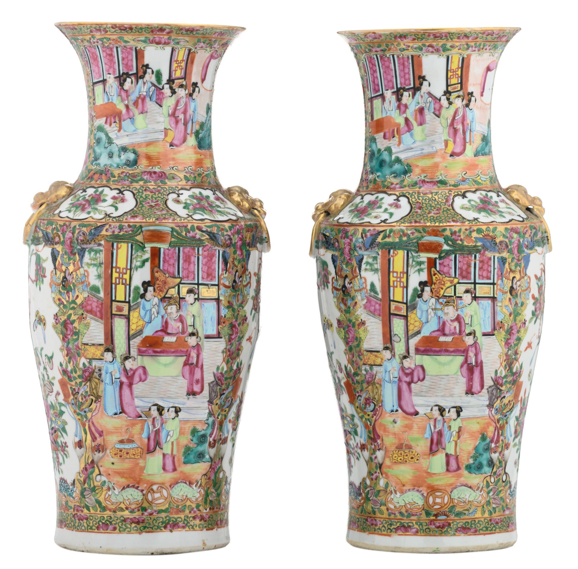 A pair of Chinese Canton famille rose floral decorated baluster shaped vases, the roundels with