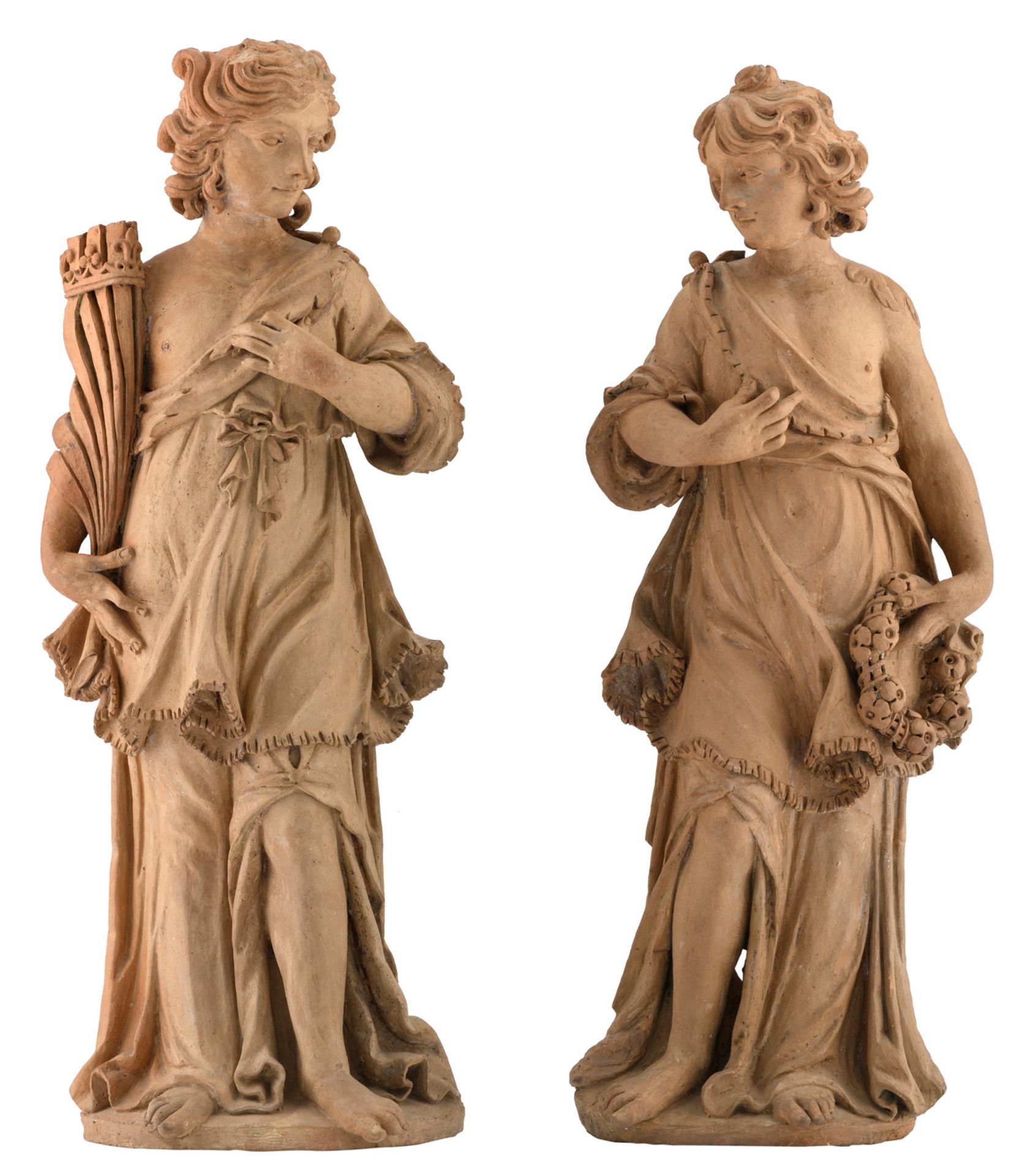 A pair of (18thC) terracotta garden statues, the reverse flattened, H 96,5 - 99,5 cm