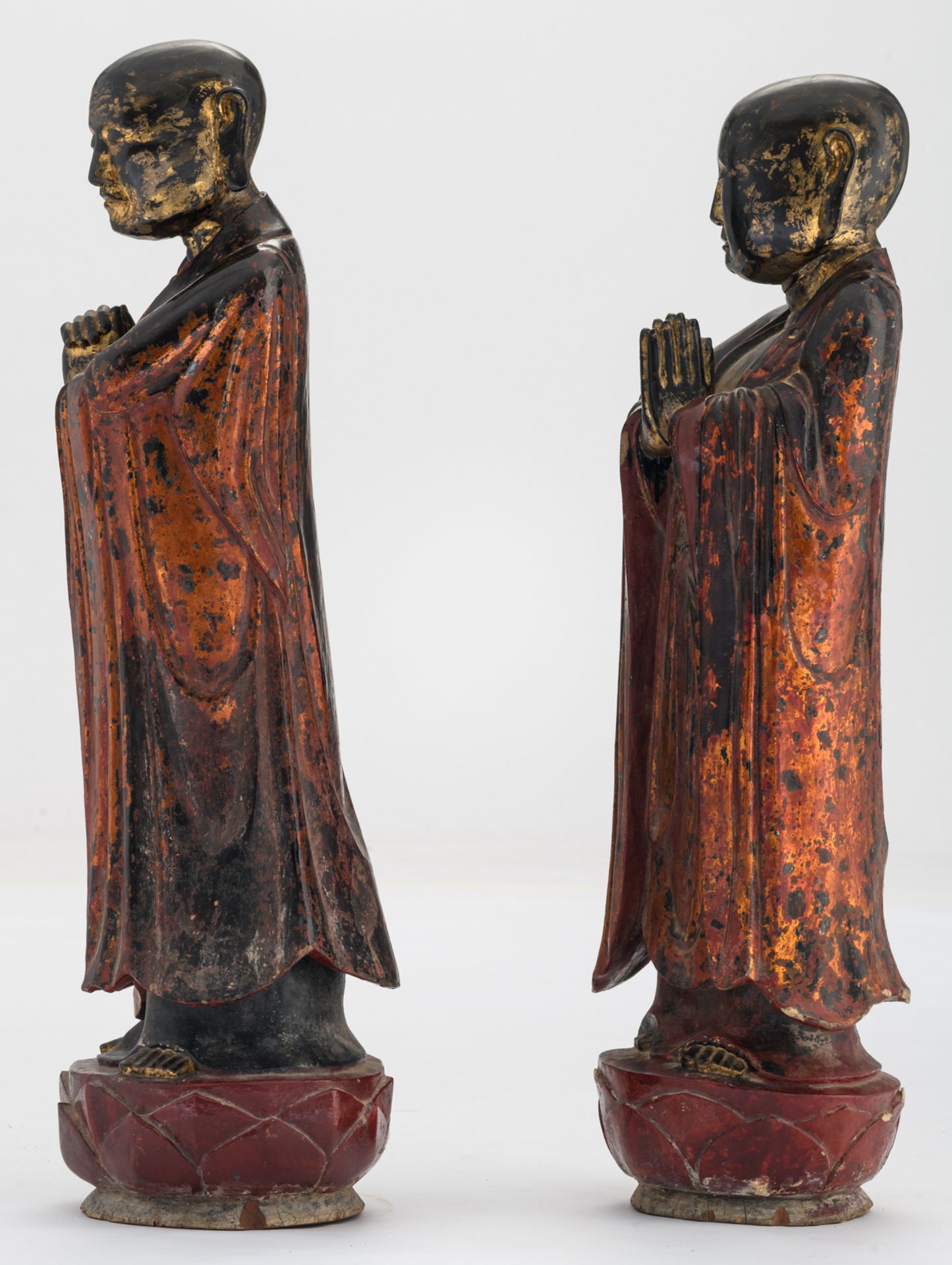 Two Oriental polychrome and gilt lacquered figures, papier maché on wood, depicting Ananda and - Image 2 of 6