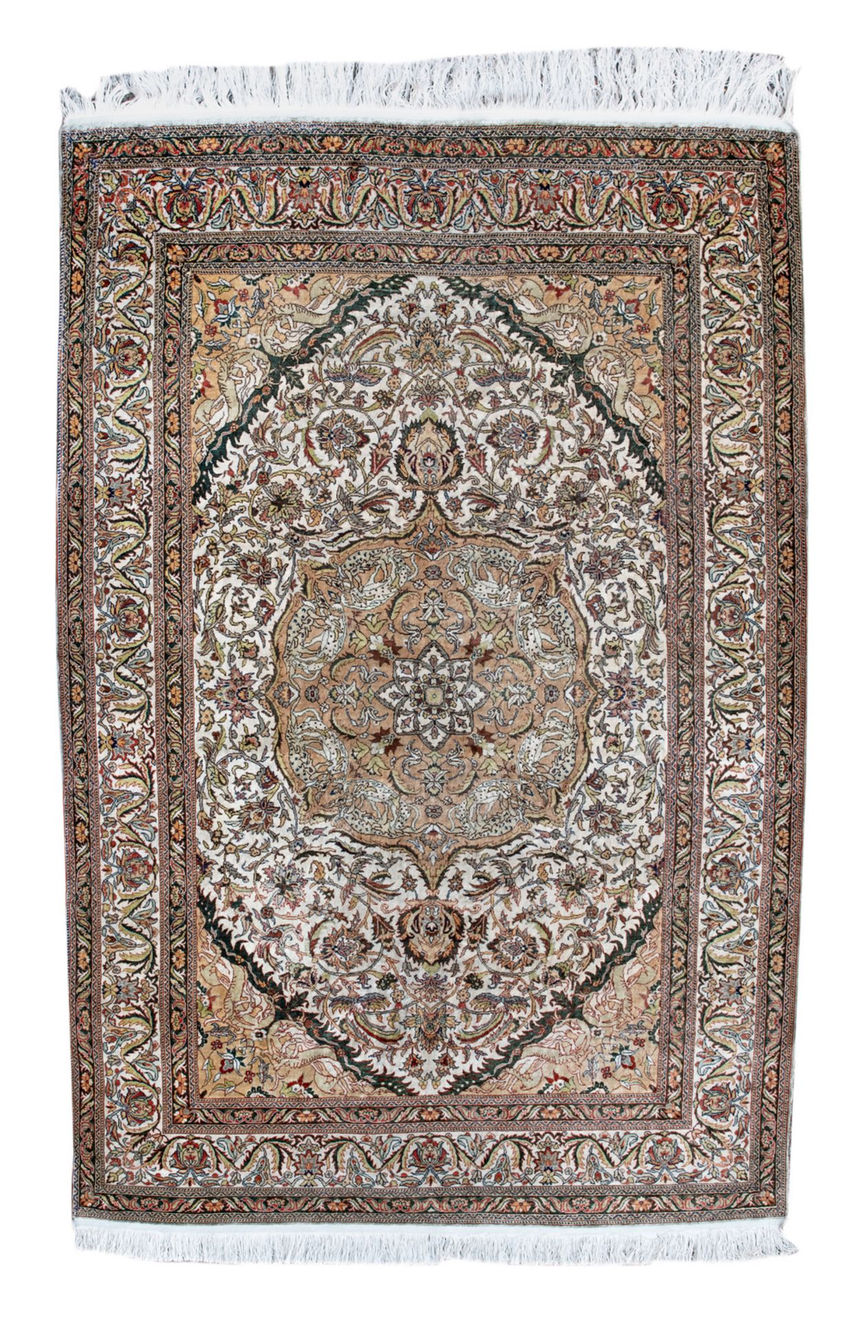 An Oriental floral decorated silk carpet with a central medallion, 127 x 198 cm