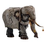 A 20thC Indian exotic hardwooden elephant with mother-of-pearl and coloured metal inlay, H 94,5 -