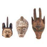 Three polychrome decorated African wooden masks, different regions and tribes (e.g. Fang - Gabon), H