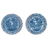 Two first half of the 18thC blue and white Dutch Delftware dishes decorated with flowers, the