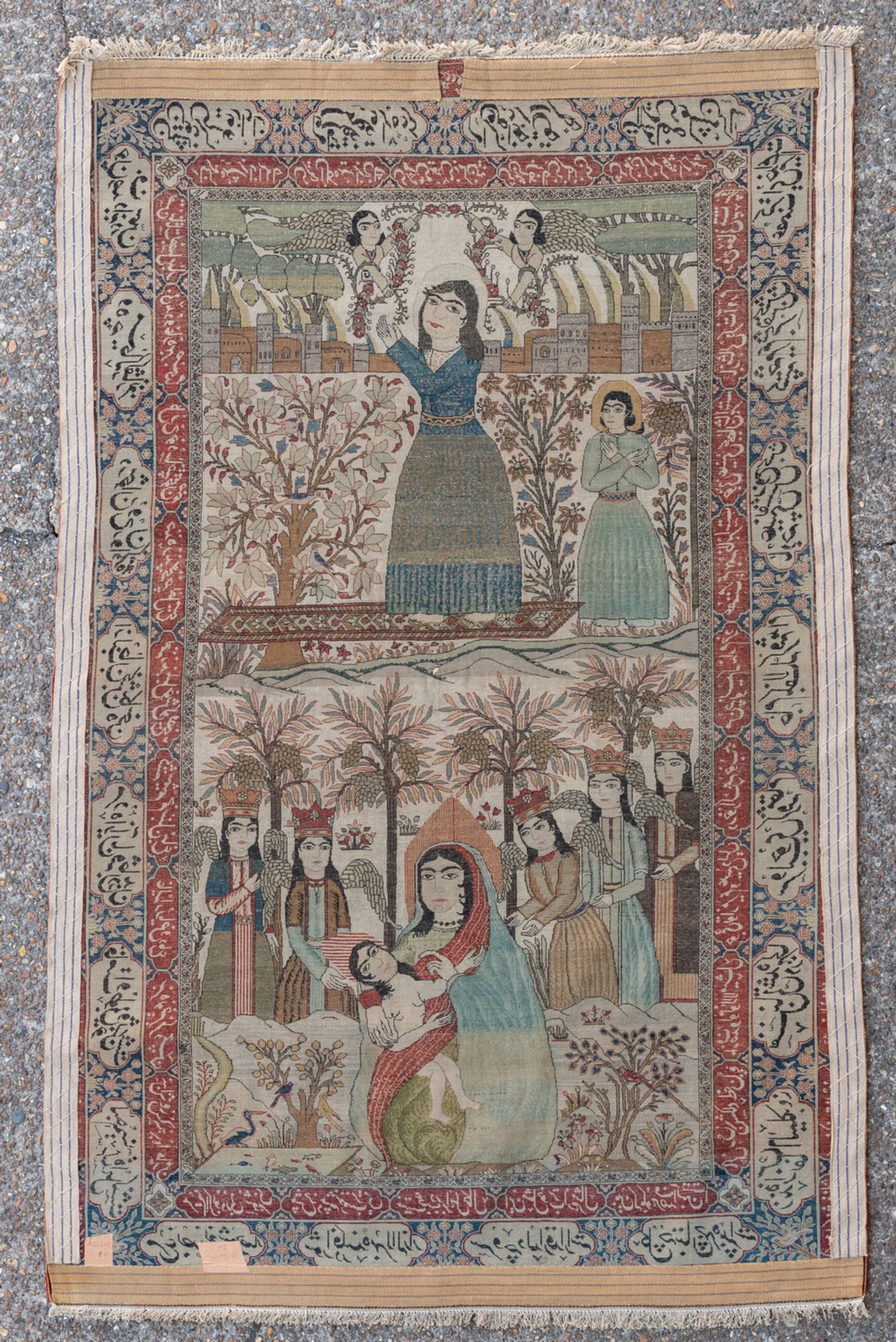 An Oriental rug with religious scenes and calligraphic inscriptions, wool on cotton, 135 x 201 cm - Image 2 of 3