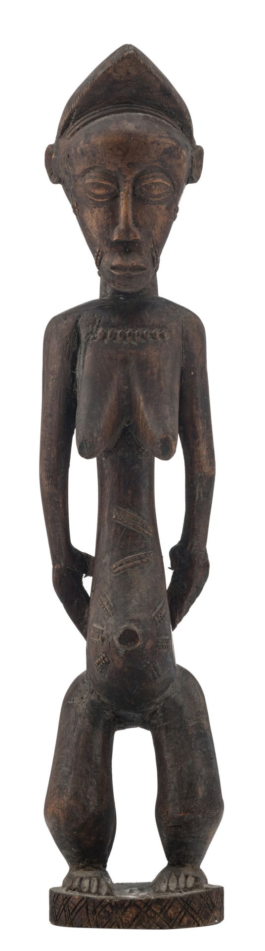 An African wooden sculpture depicting a standing female figure, possibly a blolo bla figure, Baule -