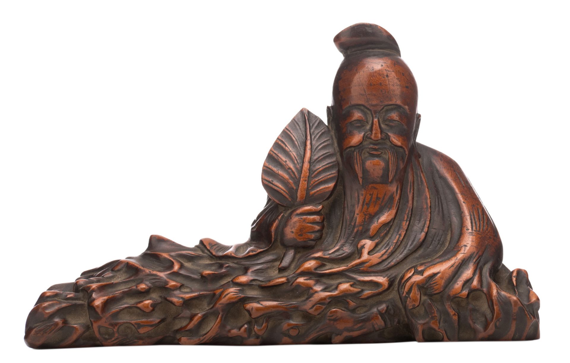 A fine Chinese carved wooden figure, depicting a lying deity, H 11 - W 17 cm