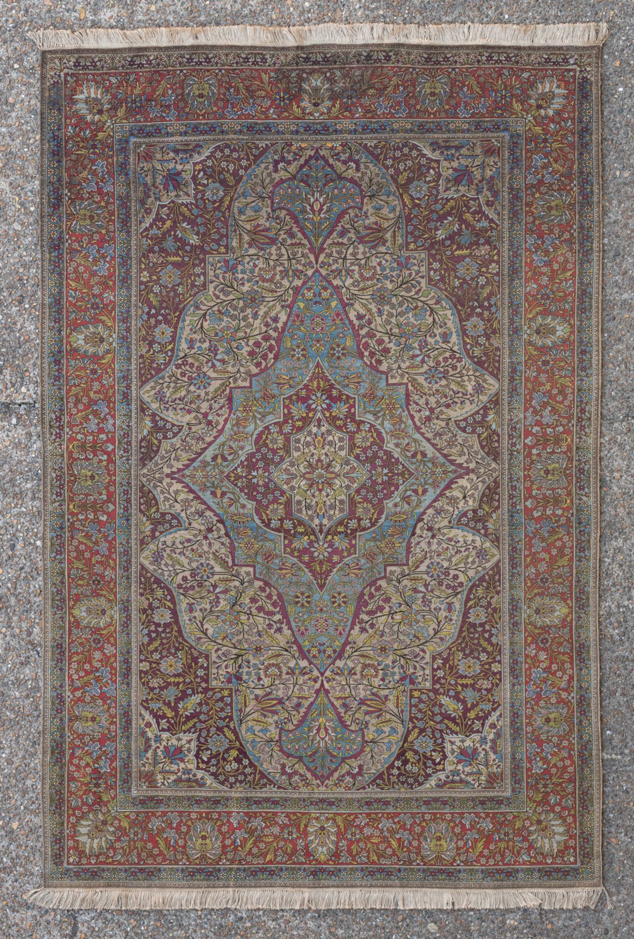 An Oriental floral decorated silk carpet with a central medallion, 135 x 203 cm - Image 2 of 3