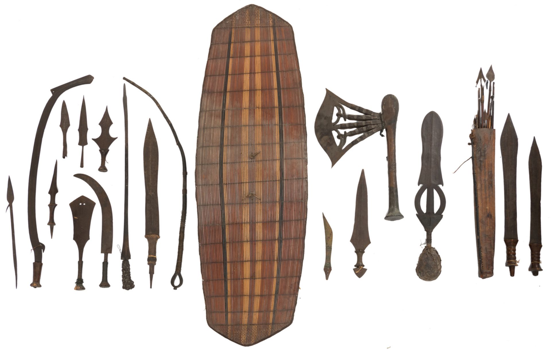 A collection of African - Congolese tribal weapons, a Songye axe and a Northern Congolese shield,