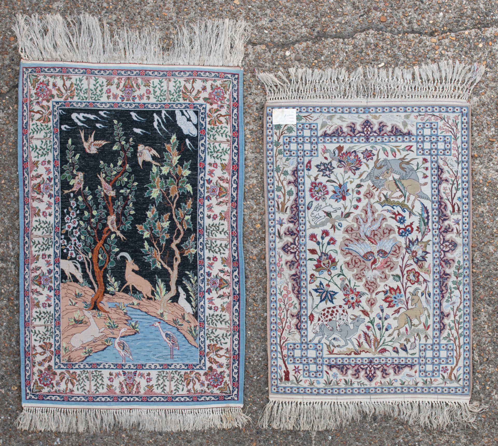 Two Oriental wool and silk carpets, floral decorated with animals, Isfahan, 70 x 98 and 77 x 112 cm - Image 2 of 4