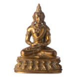 A fine Sino-Tibetan gilt bronze seated Buddha with semi-precious stone inlay, 18thC, H 9,5 cm