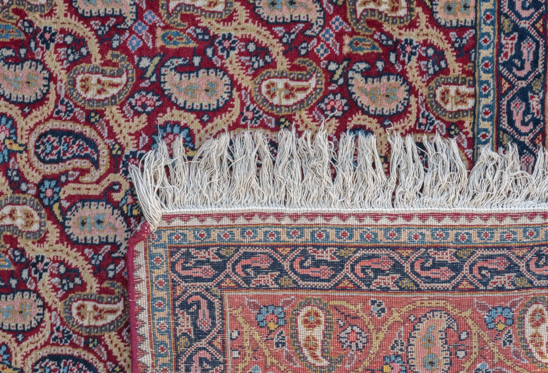 An Oriental carpet decorated with floral cones, wool on cotton, Daruksh / Meshed, about 1900, 136, - Image 3 of 3