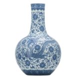 A large Chinese blue and white bottle vase, decorated with a dragon amid scrolling lotus, H 58,5 cm