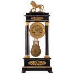 A mid 19thC Neoclassical ebony and ebonized wooden gilt bronze mounted portico clock, the dial