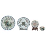 Two Chinese famille rose floral decorated dishes, one dish on a matching wooden stand, and a ditto