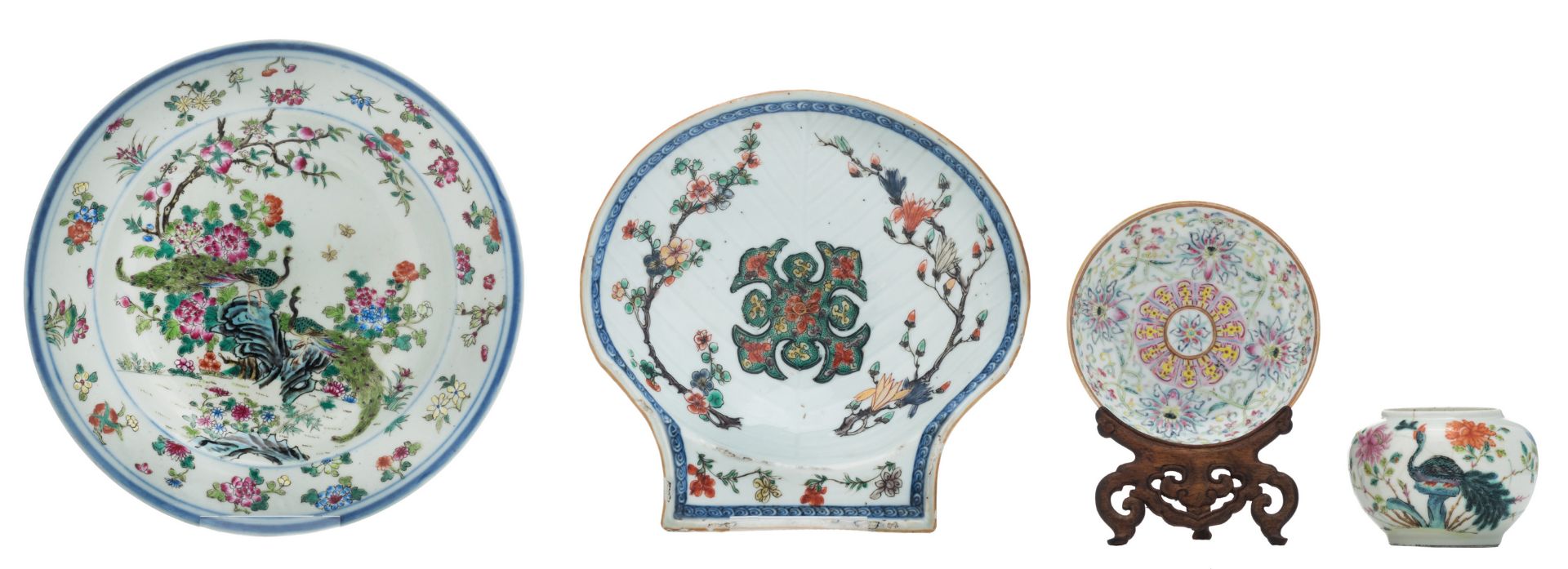 Two Chinese famille rose floral decorated dishes, one dish on a matching wooden stand, and a ditto