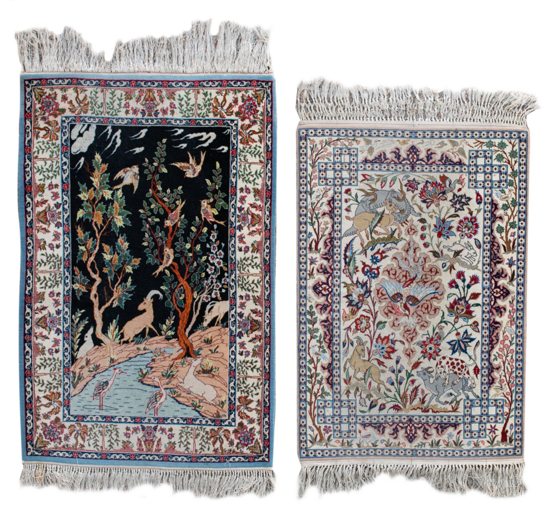 Two Oriental wool and silk carpets, floral decorated with animals, Isfahan, 70 x 98 and 77 x 112 cm