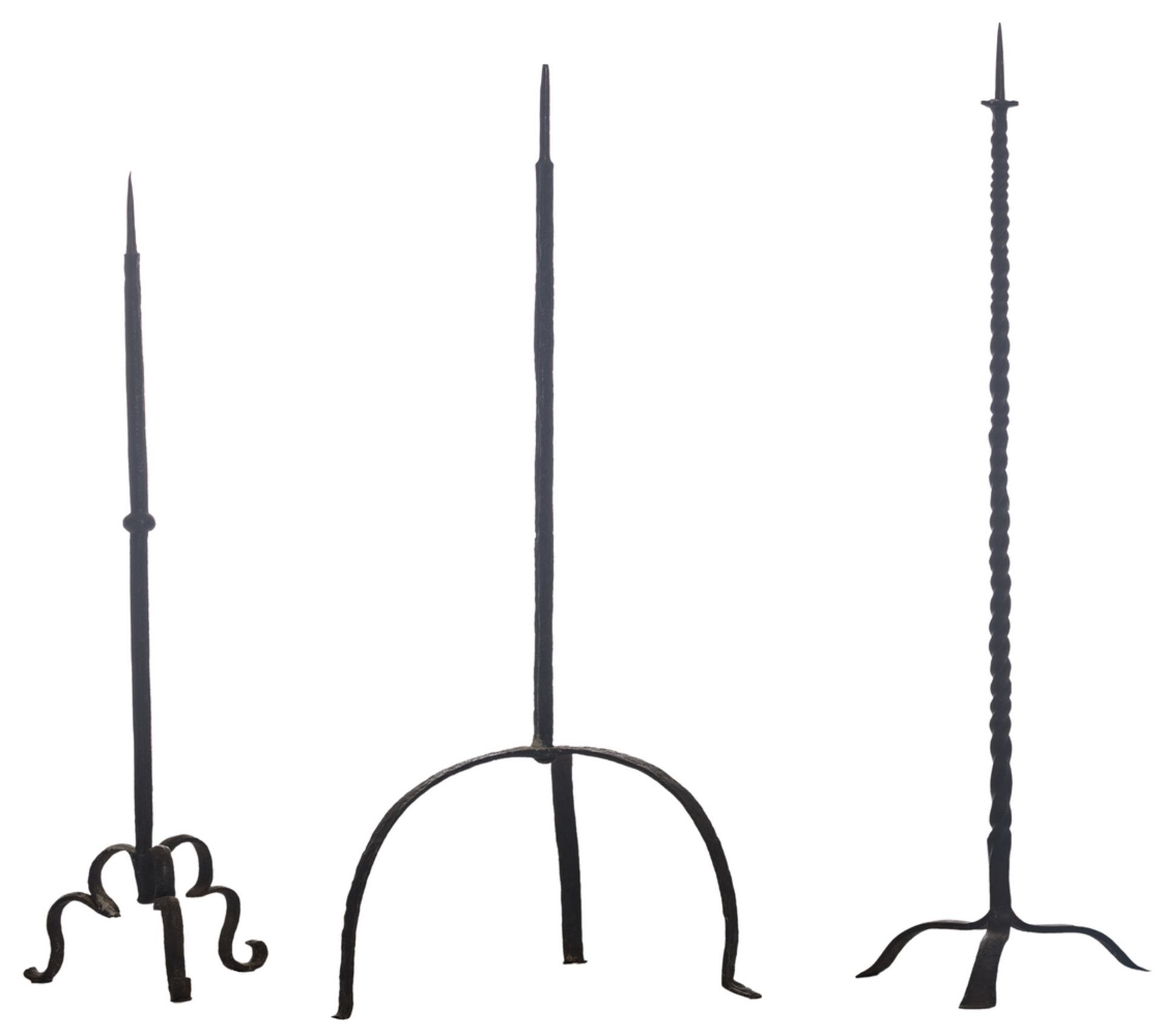 Three wrought iron church candlesticks, H 120,5 - 146,5 cm