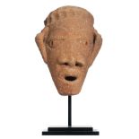 A terracotta head sculpture from the Nok culture (500 B.C. - 200 A.D.), Nigeria, H 25 cm