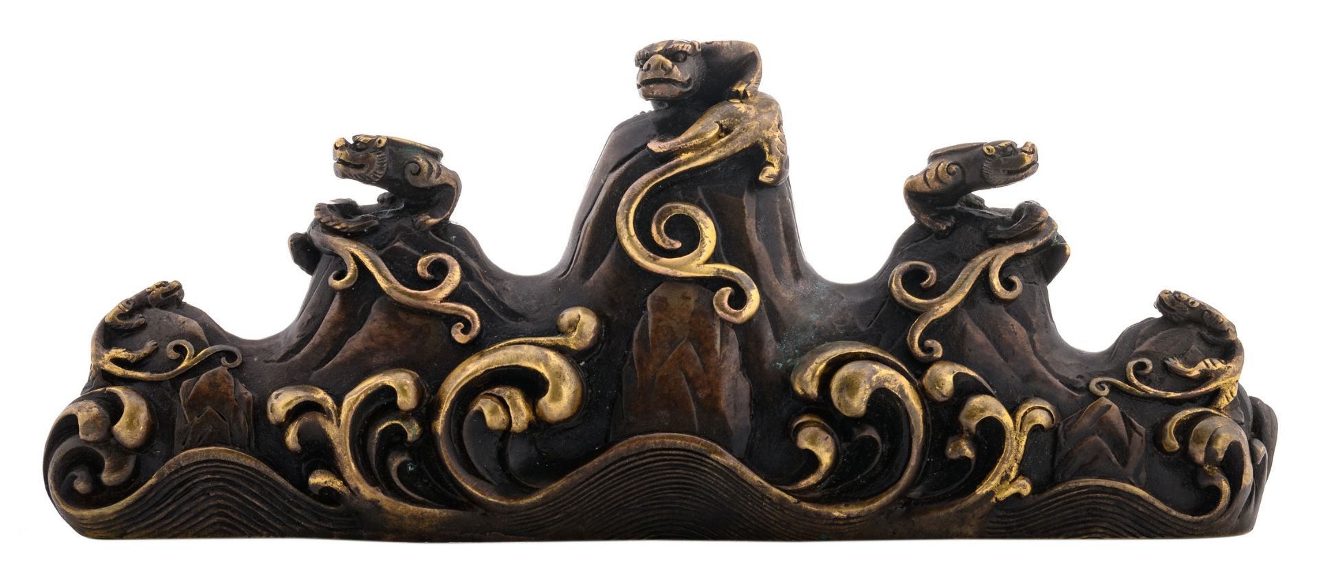 A Chinese patinated bronze scholar's brush rest depicting chilong climbing rocks situated in
