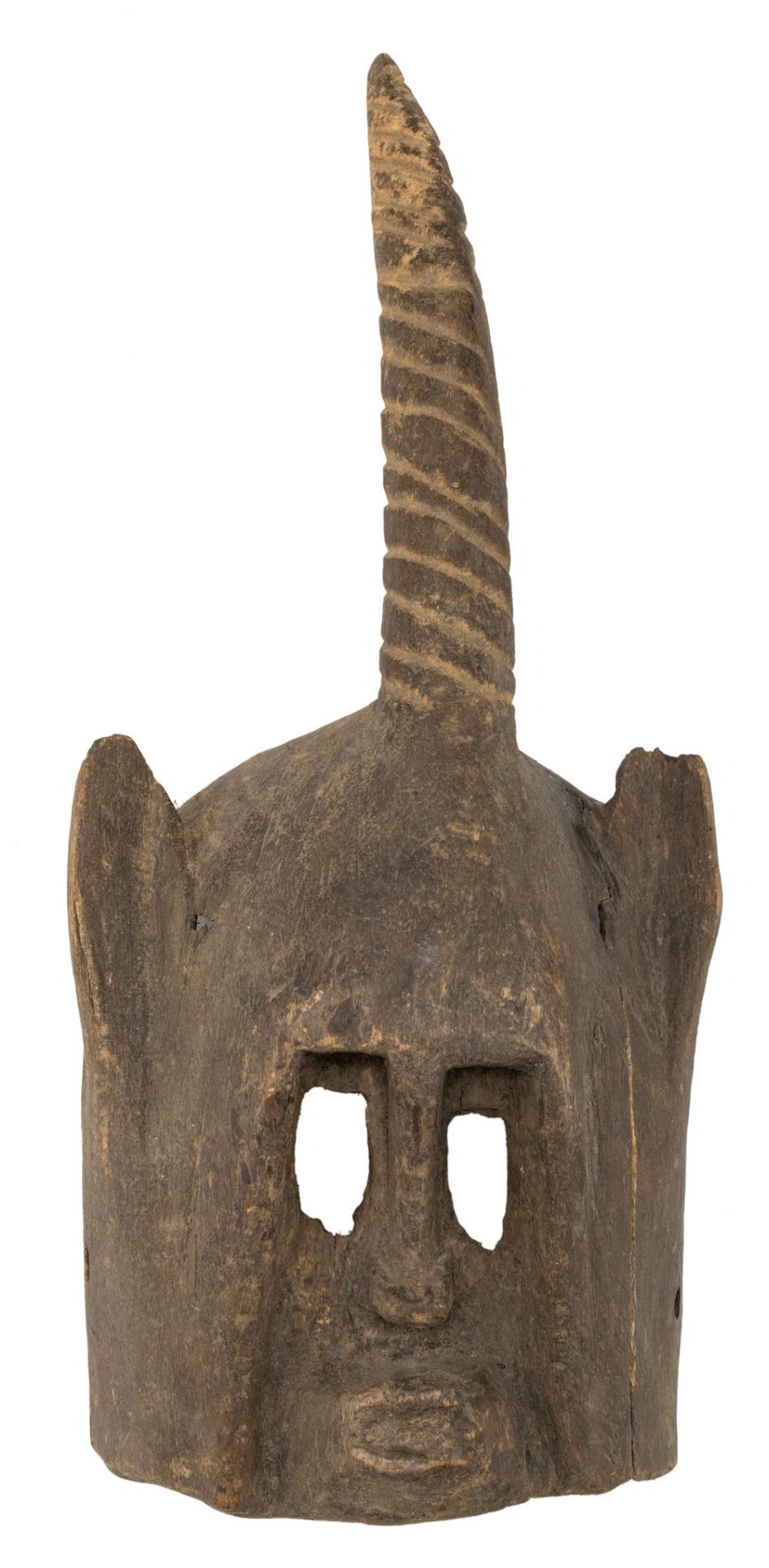 A traditional African wooden mask with on top a horn, Dogon - Mali, H 37 cm