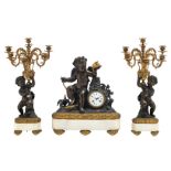 A Neoclassical three-piece patinated and gilt bronze garniture, consisting of the mantle clock and