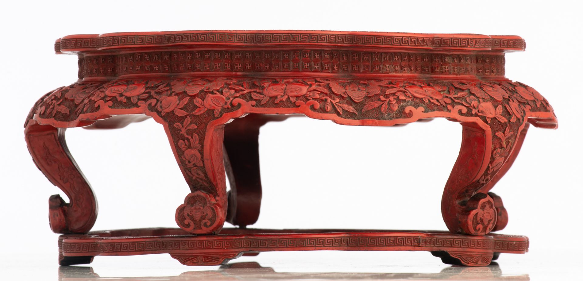 A Chinese red cinnabar lacquered stand with lobed top, the legs ruyi shaped, 18th / 19thC, - Image 3 of 7