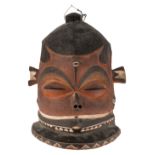 A traditional African polychrome decorated wooden mask, Pende - Congo, H 31,5 cm