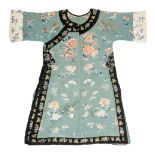 A Chinese green-blue silk lady summer dress, embroidered with flowers and butterflies, 19thC, H