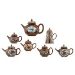 Six Chinese café au lait famille rose and Imari decorated tea pots and covers, 18thC; added a