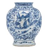 A Chinese blue and white Wanli vase, floral decorated, the roundels with figures in a landscape,