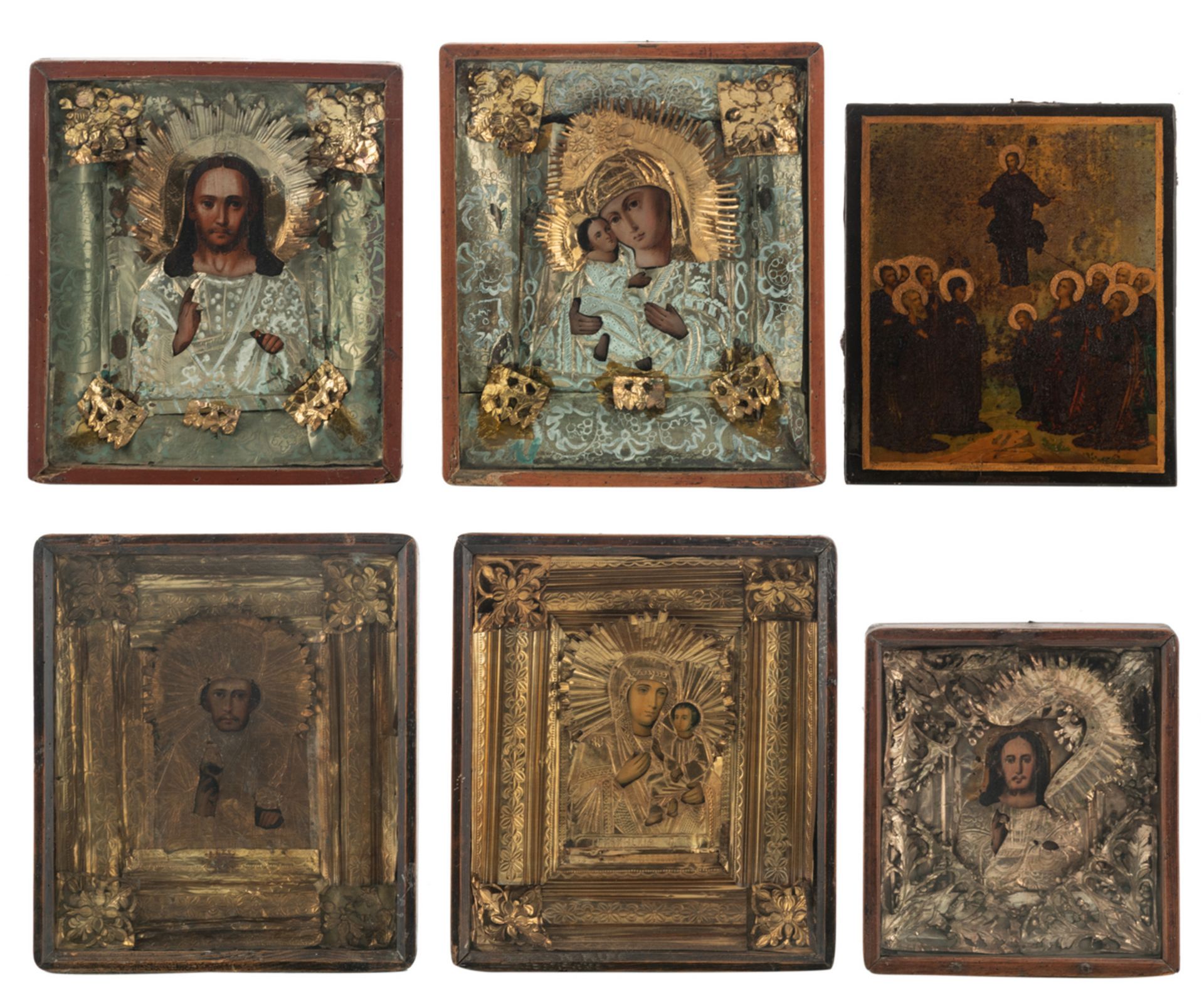 Six East European icons, some of which lithographs, with gilt and silver plated metal oklad, five in