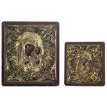 One bigger and one smaller East European 19th / 20thC icon, set with a gilt metal reza, 44 x 39 -